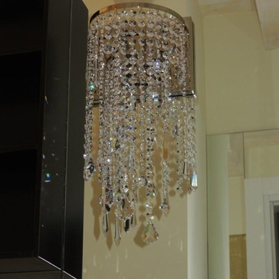 Applique con cristalli finitura nikel.